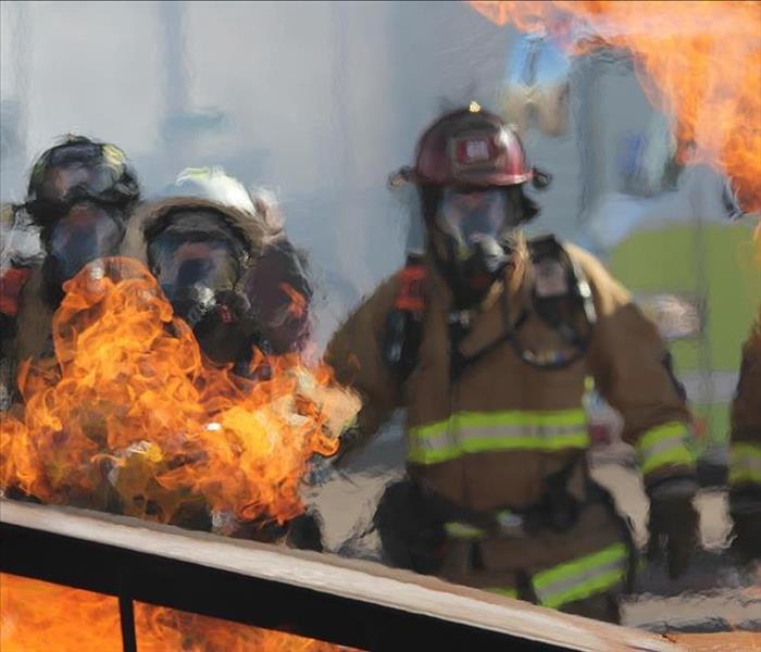 firefighter extinguishing a fire