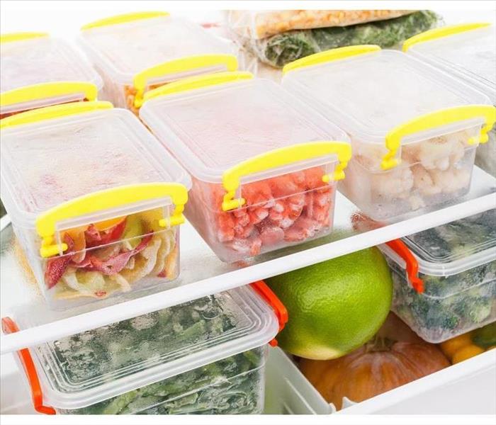 food stored in storage containers in refrigerator