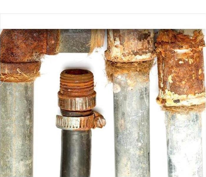 rusty metal pipes on a white background