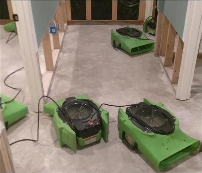 drying equipment in a home after a flood