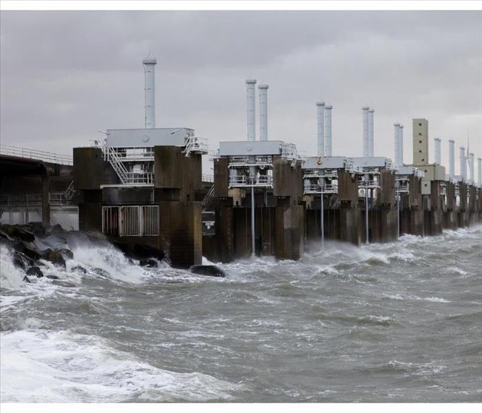 Storm surge barrier is closed to protect against storm and flood